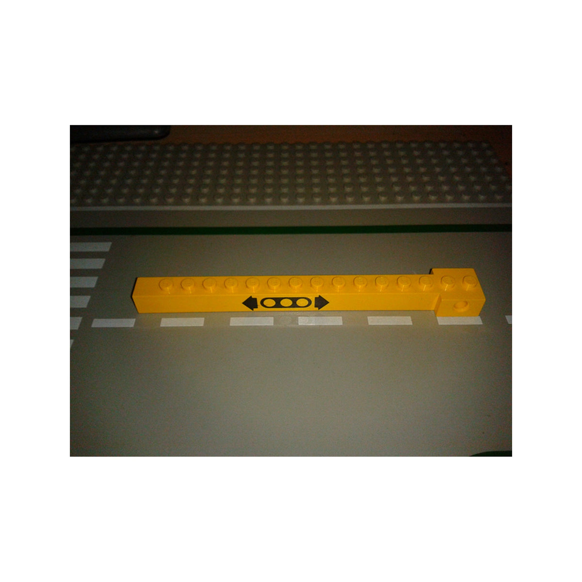 LEGO® Crane Arm Outside, Narrow with 15 studs with Black Arrows and 3L Liftarm Pattern 2350dpb01 gelb