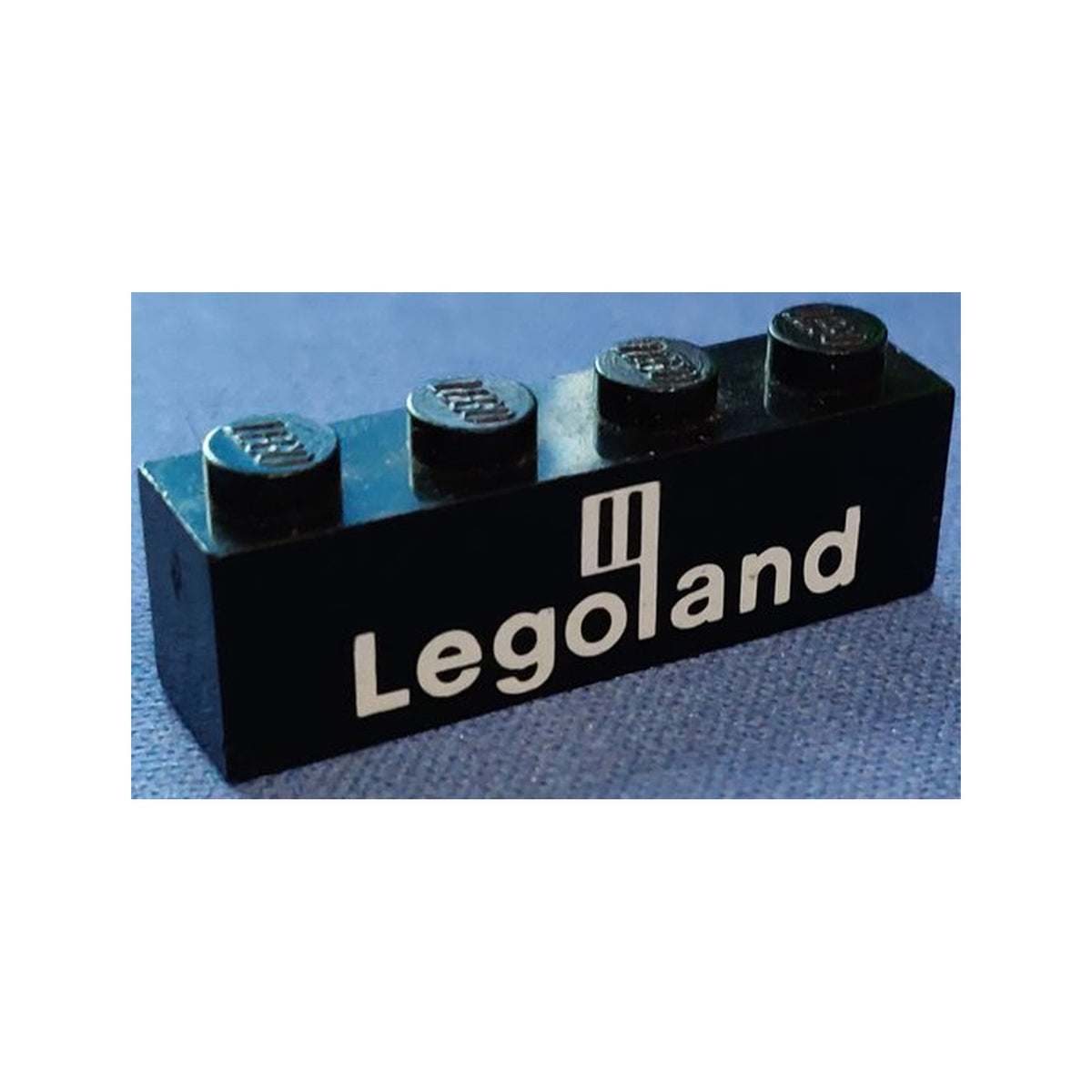 LEGO® Brick 1 x 4 with White Legoland Logo Pattern 3010p31 schwarz
